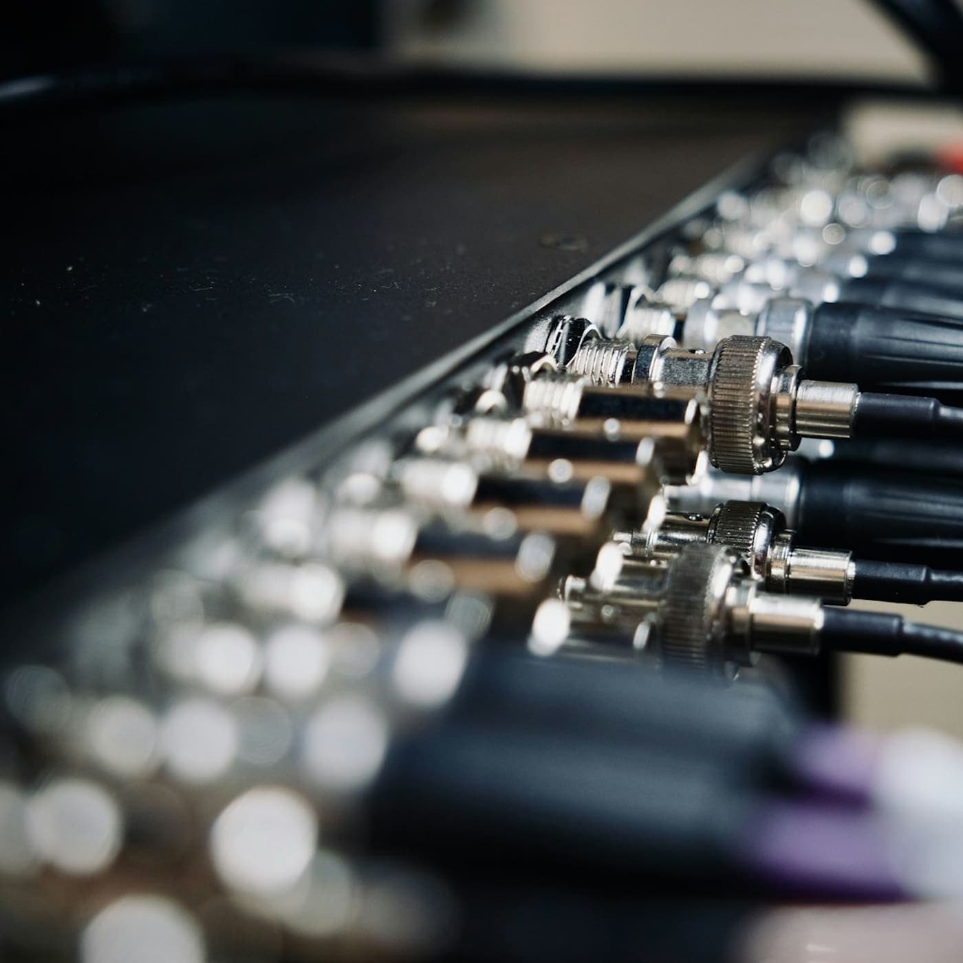 Row of coaxial connectors and jumper cables